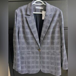 Beautiful Women’s blazer. Size XXL. Ricki’s. Fully lined. BNWT! Pockets.